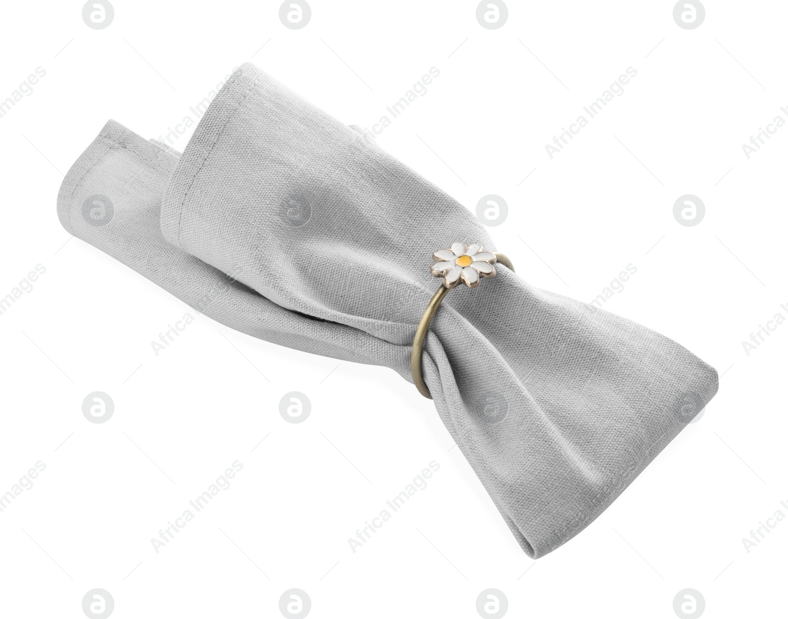 Photo of Napkin with decorative ring for table setting isolated on white