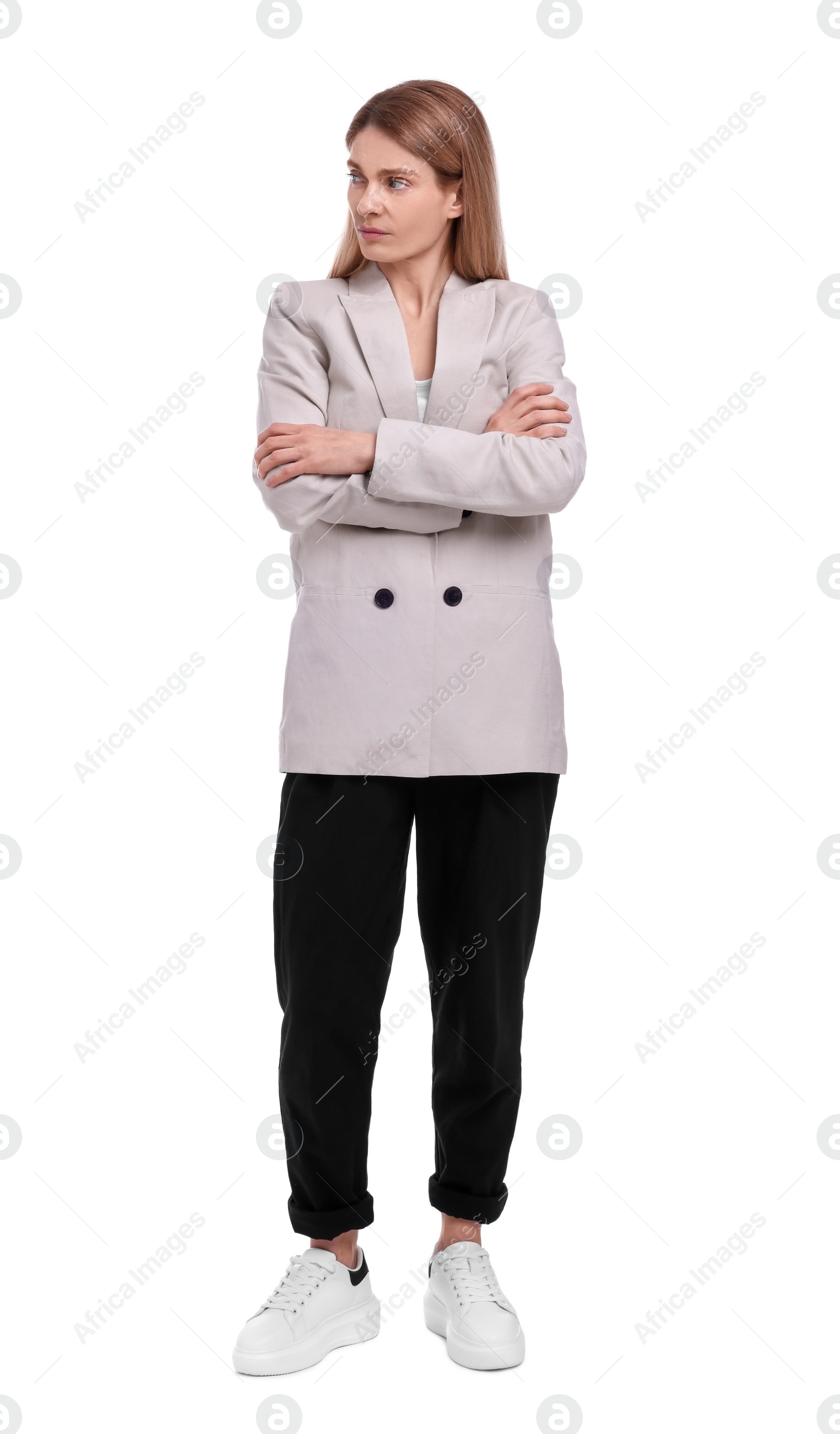 Photo of Beautiful businesswoman crossing arms on white background