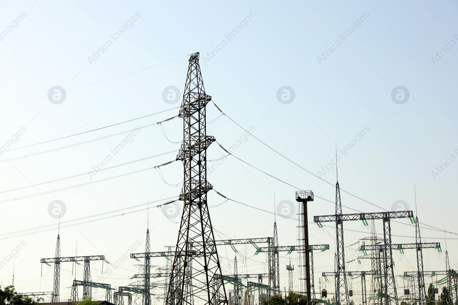 Photo of Modern electrical substation on sunny day, low angle view