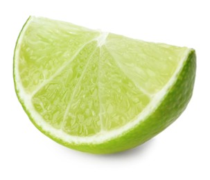 Slice of fresh green ripe lime isolated on white