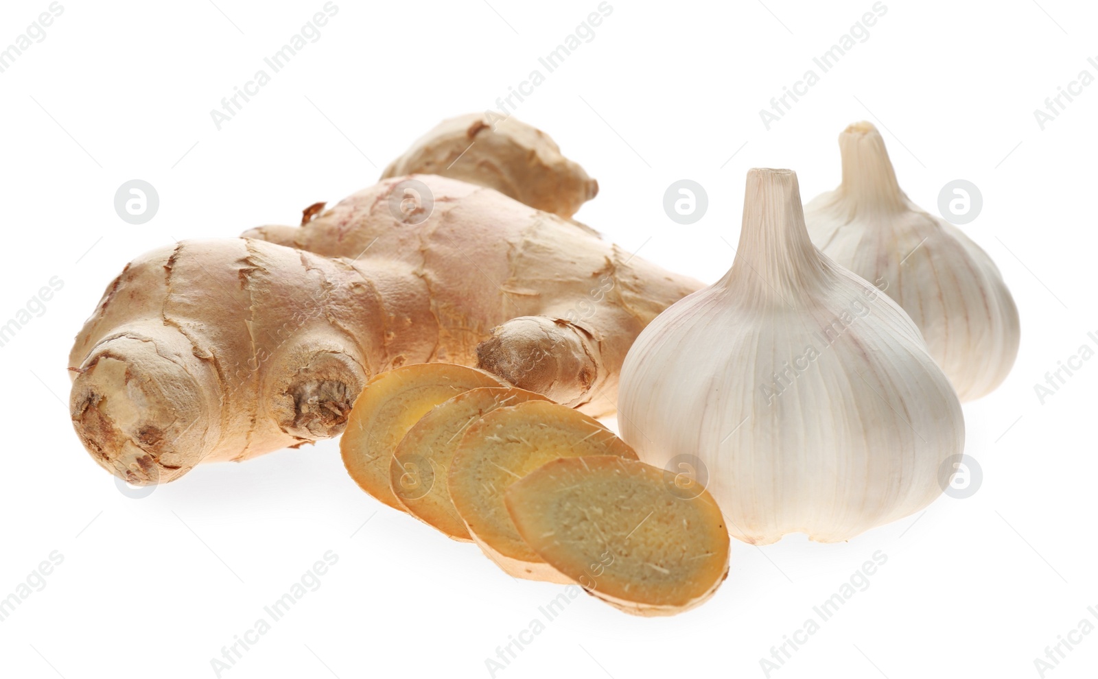 Photo of Ginger and fresh garlic on white background. Natural cold remedies