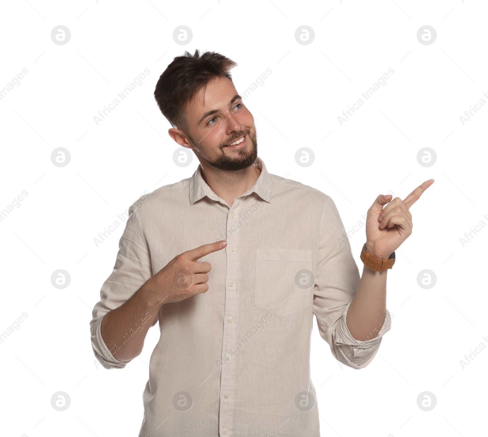 Photo of Handsome young man gesturing on white background