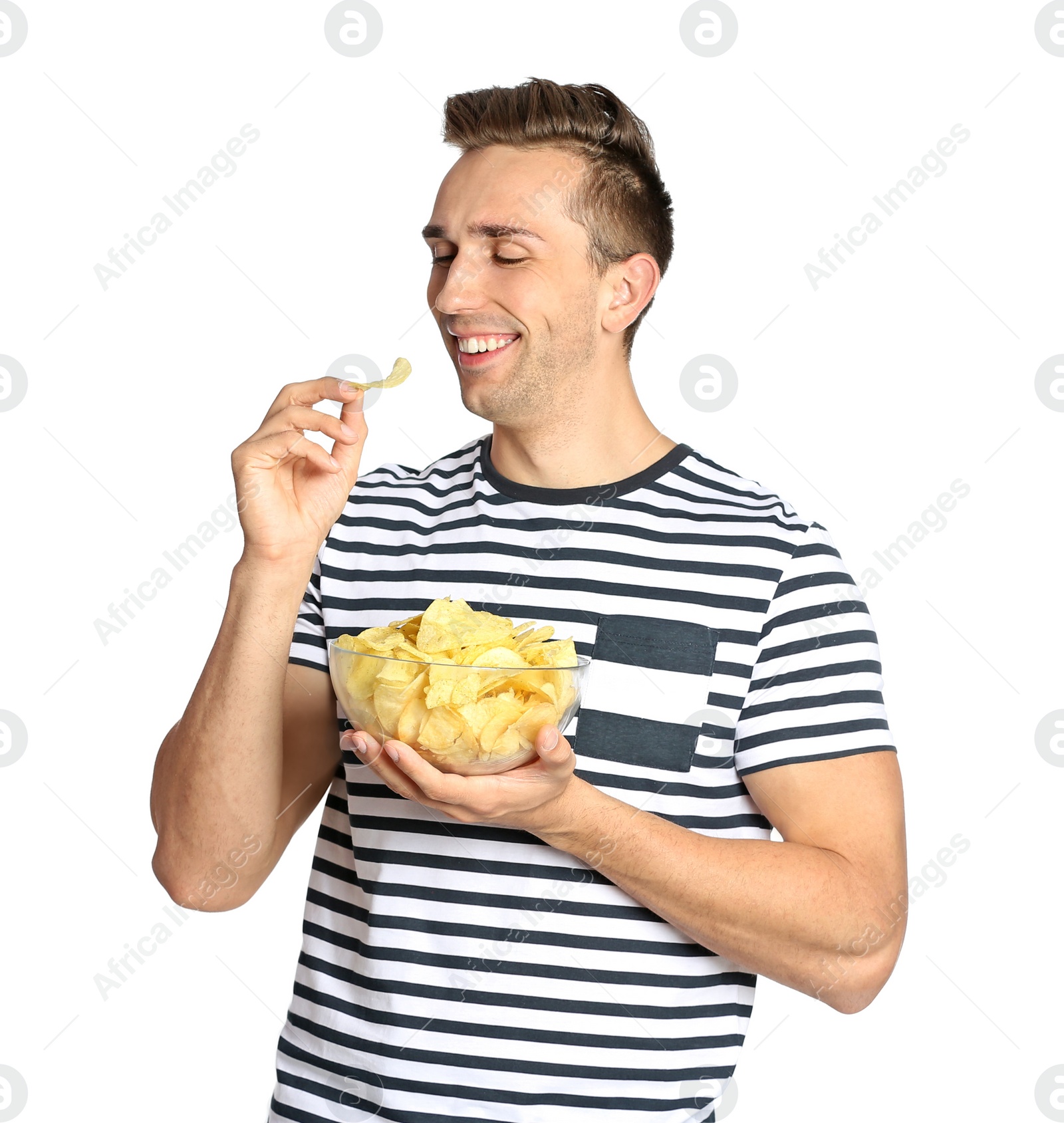 Photo of Man eating potato chips on white background