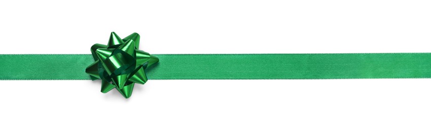 Photo of Green ribbon with bow on white background, top view