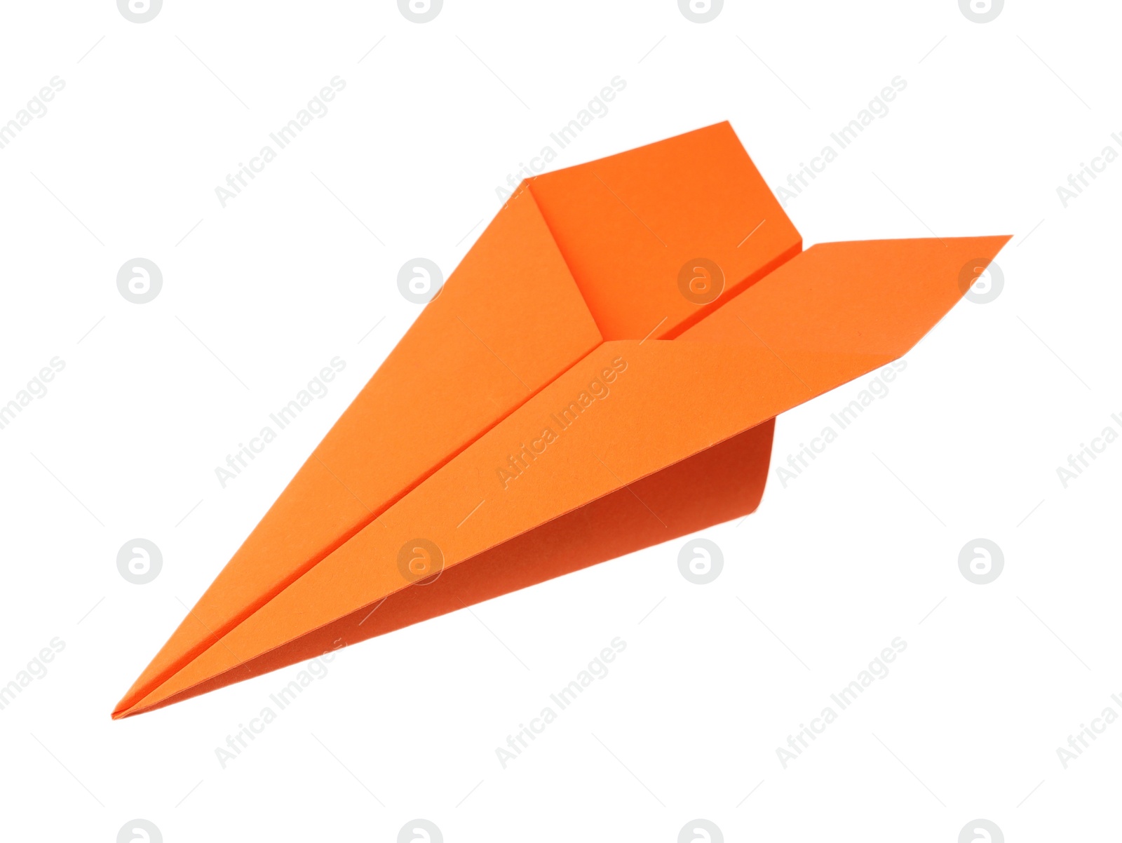 Photo of Handmade orange paper plane isolated on white