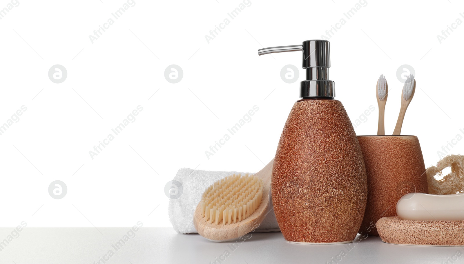 Photo of Bath accessories. Different personal care products on table against white background. Space for text