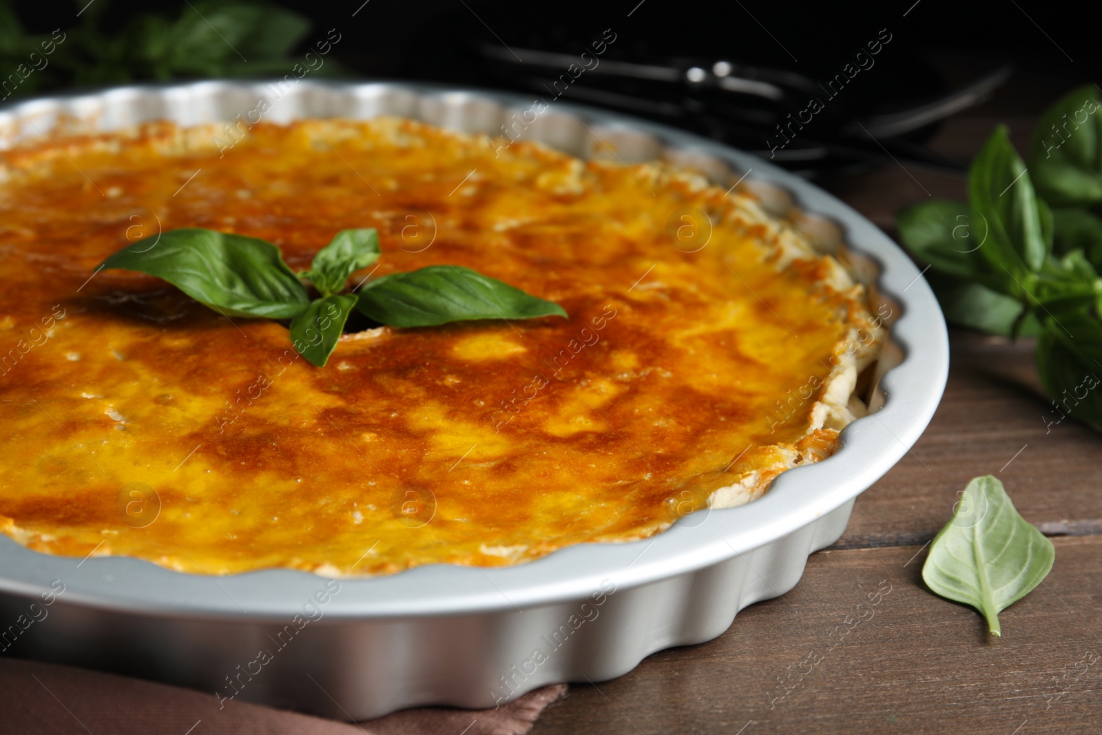 Photo of Delicious pie with minced meat on wooden table, closeup