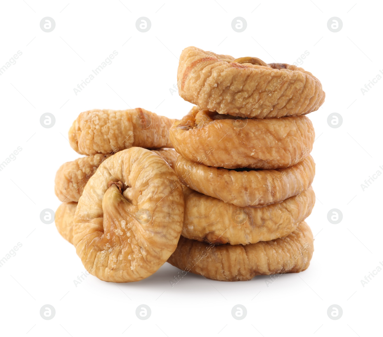 Photo of Stacked tasty dried figs isolated on white