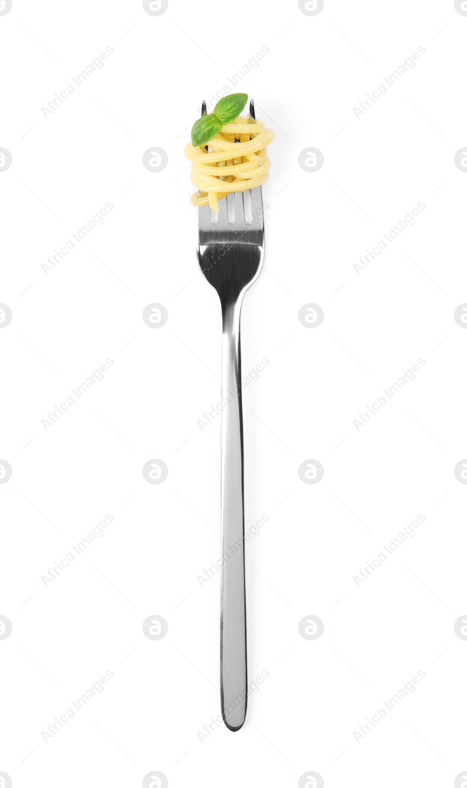 Photo of Fork with tasty pasta and basil isolated on white, top view