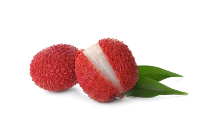 Photo of Fresh ripe lychees with green leaves on white background