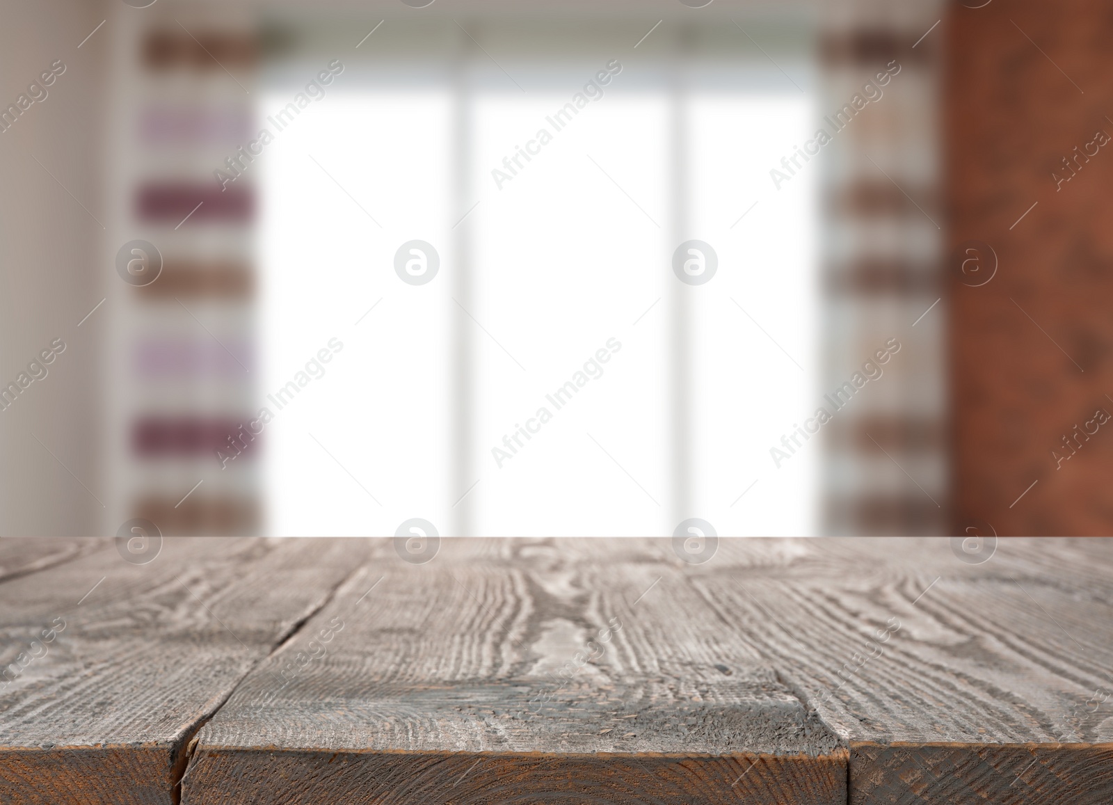 Image of Empty wooden surface and blurred view of modern window 