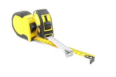 Photo of Measuring tapes on white background