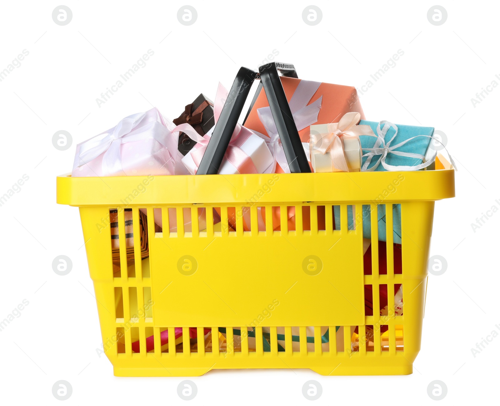 Photo of Shopping basket full of gift boxes on white background