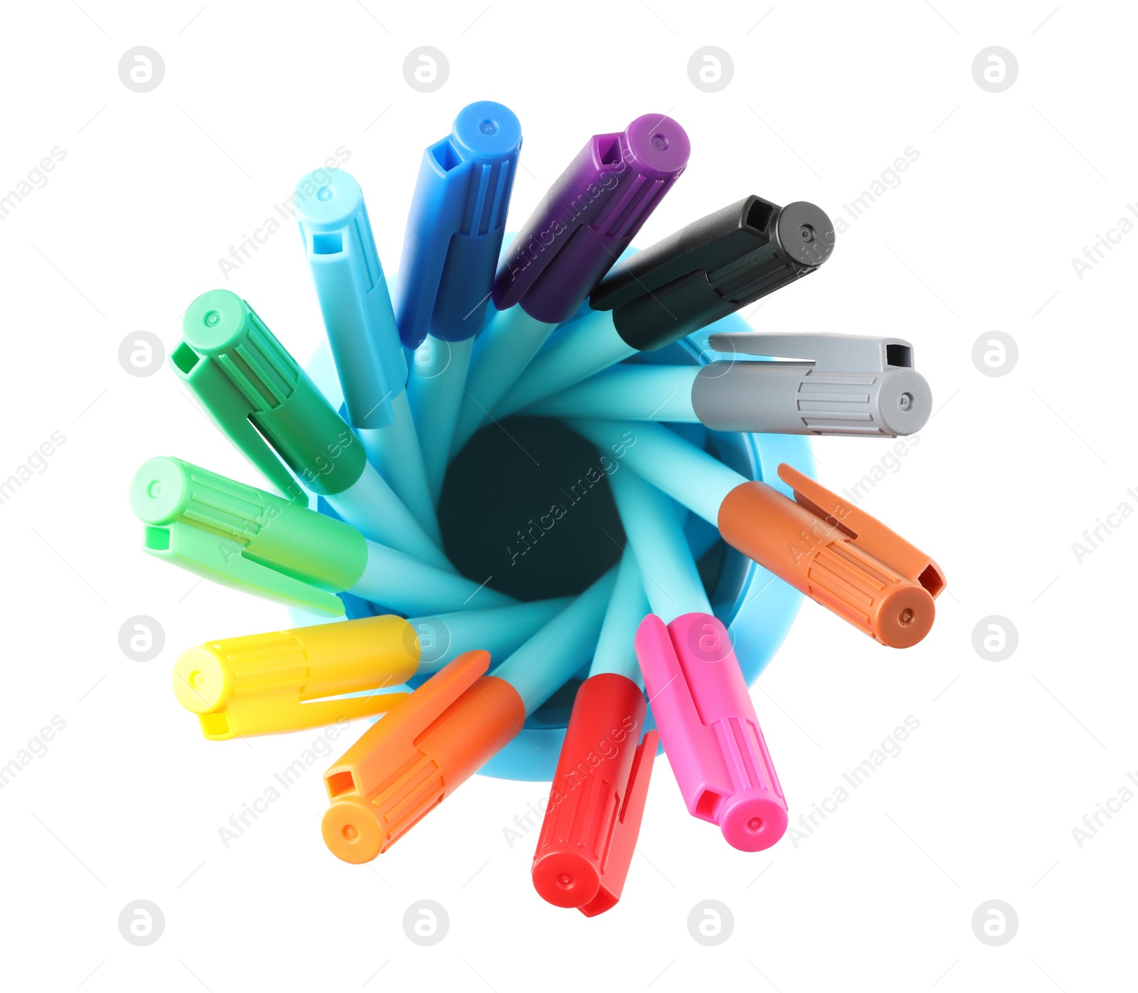 Photo of Different color felt tip pens in holder on white background, top view. School stationery