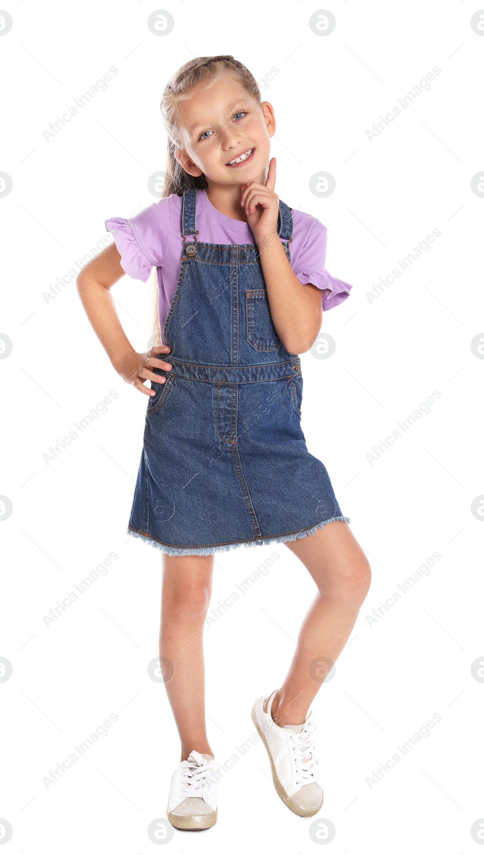 Photo of Full length portrait of adorable little girl on white background
