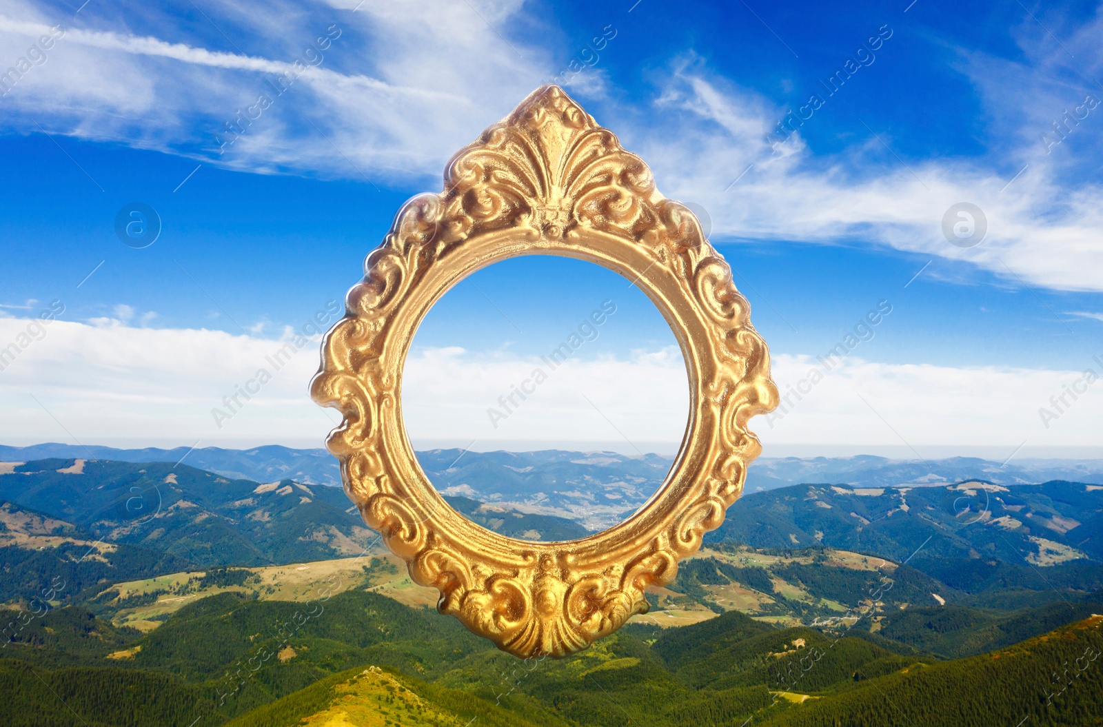 Image of Vintage frame and beautiful mountains under blue sky with clouds