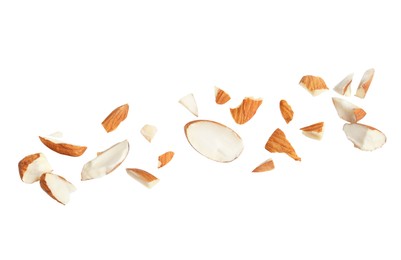 Photo of Pieces of tasty almonds on white background