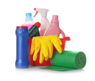 Photo of Bucket with cleaning supplies on white background