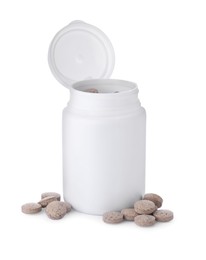 Plastic jar with brewer's yeast tablets isolated on white