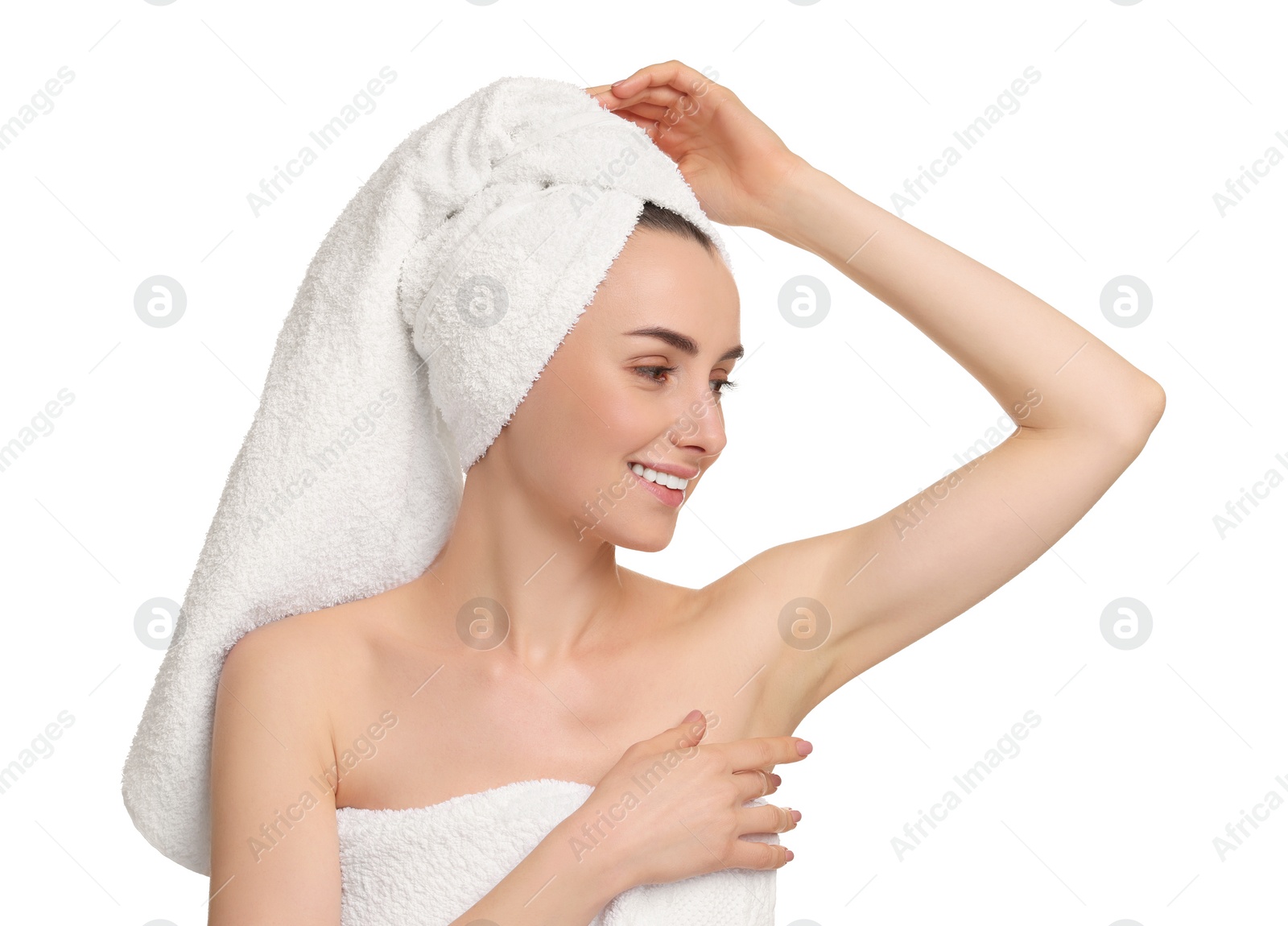 Photo of Beautiful woman showing armpit with smooth clean skin on white background