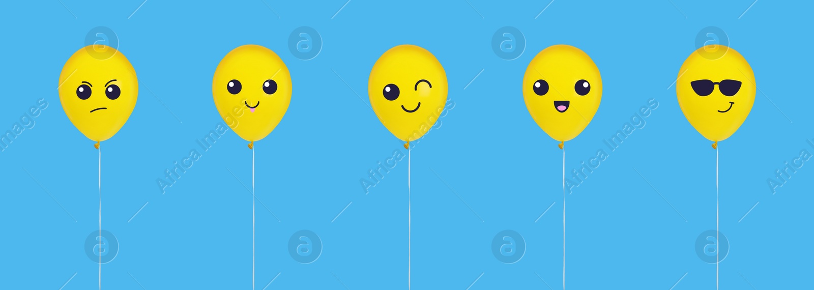 Image of Set of balloons with different emoticons on light blue background. Banner design