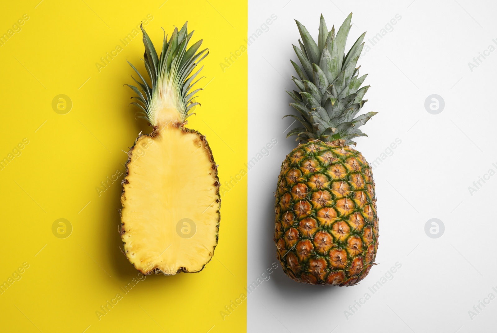 Photo of Tasty raw pineapples on color background, flat lay