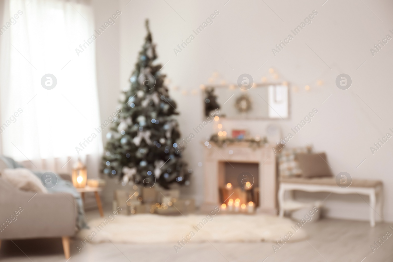 Photo of Blurred view of stylish living room interior with decorated Christmas tree