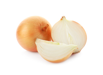 Whole and cut onion bulbs on white background