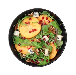 Tasty salad with persimmon, blue cheese, pomegranate and walnuts isolated on white, top view