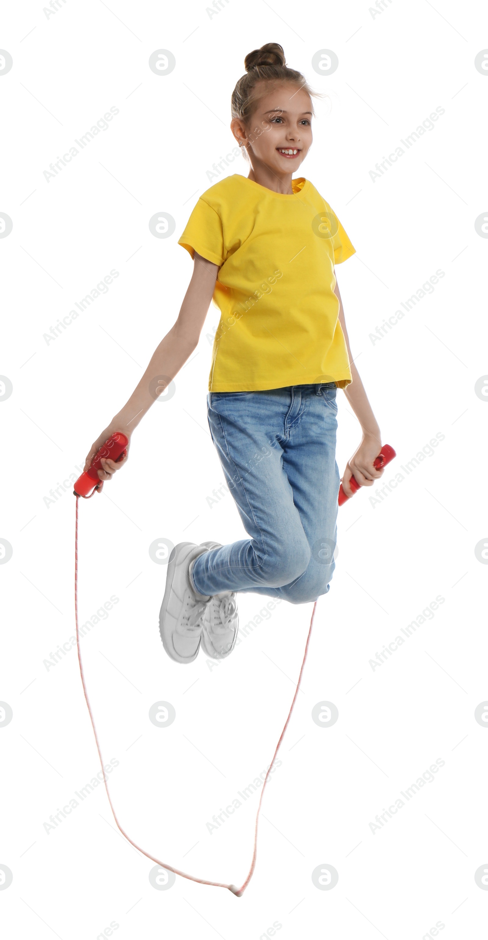 Photo of Cute little girl with jump rope on white background