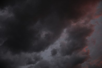 Picturesque view of sky with heavy rainy clouds. Stormy weather