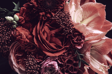 Beautiful bouquet of different flowers, closeup. Floral card design with dark vintage effect