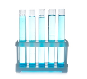 Photo of Test tubes with liquid in holder on table against white background. Laboratory analysis