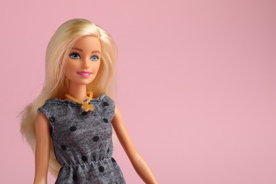 Photo of Mykolaiv, Ukraine - September 2, 2023: Beautiful Barbie doll on pale pink background, space for text