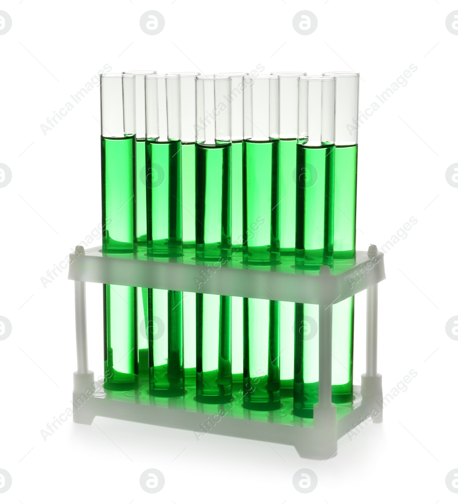 Photo of Test tubes with green liquid on white background