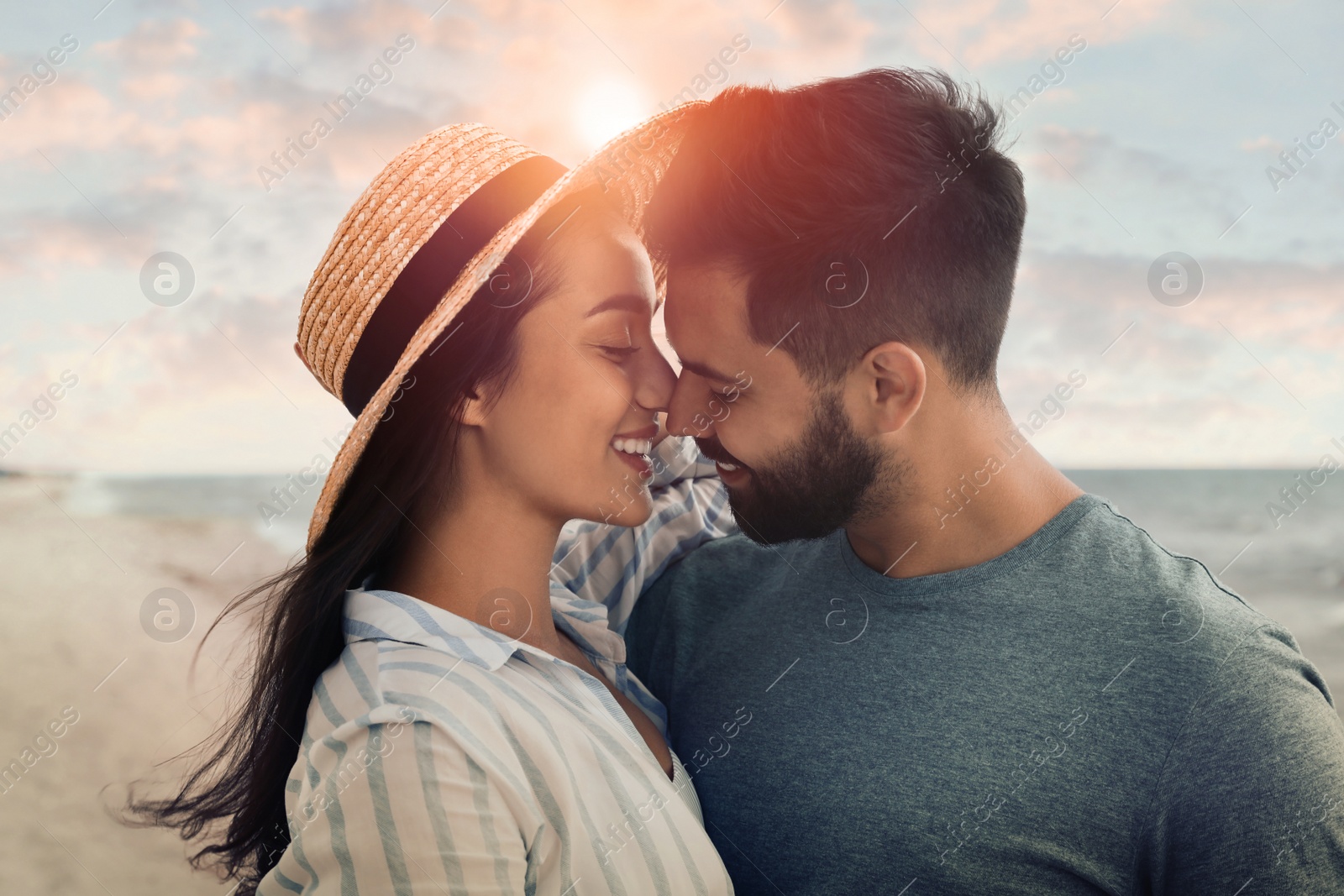 Photo of Lovely couple spending time together on beach