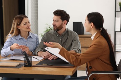 Couple having meeting with lawyer in office