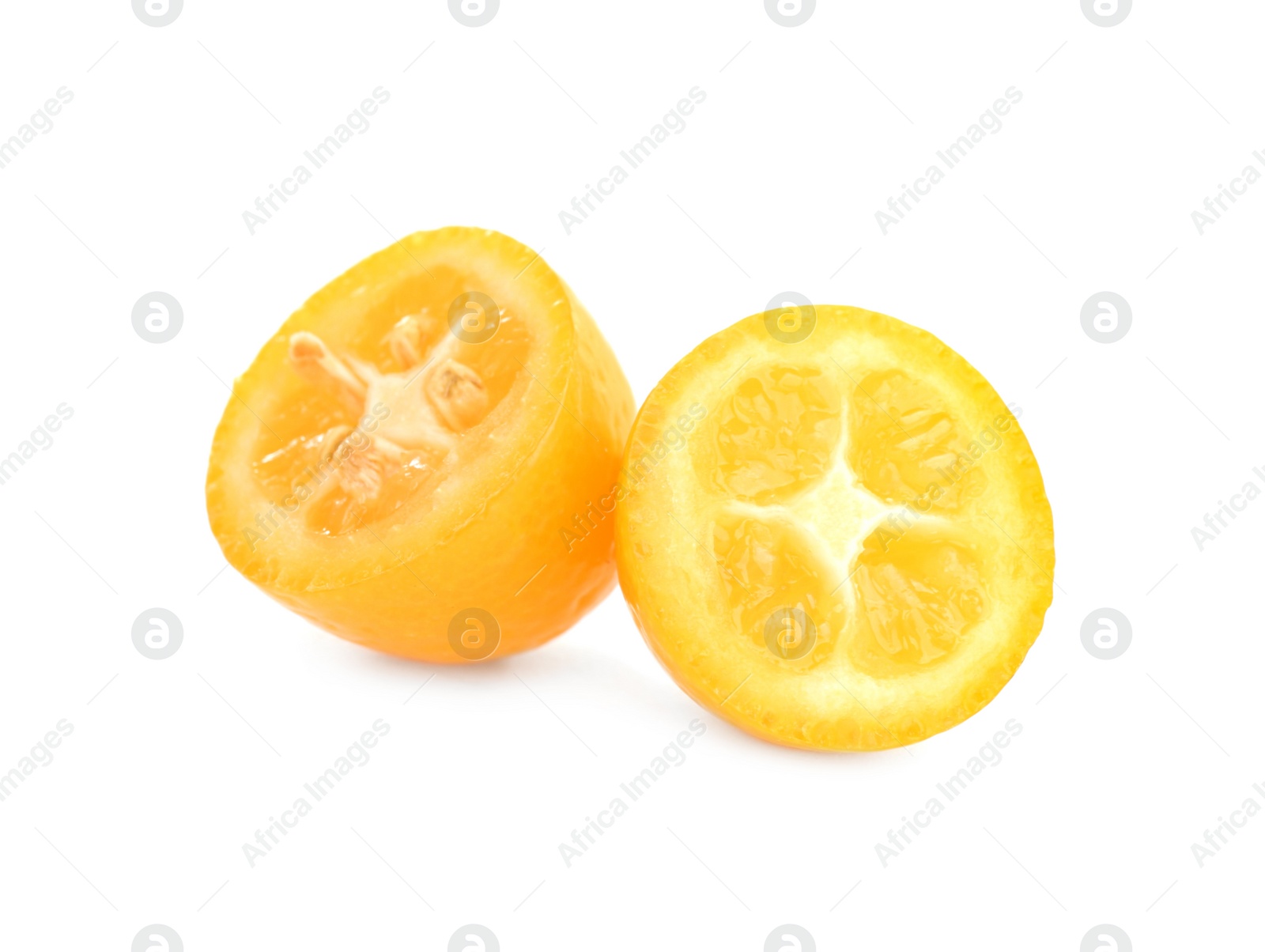 Photo of Halves of fresh ripe kumquat on white background