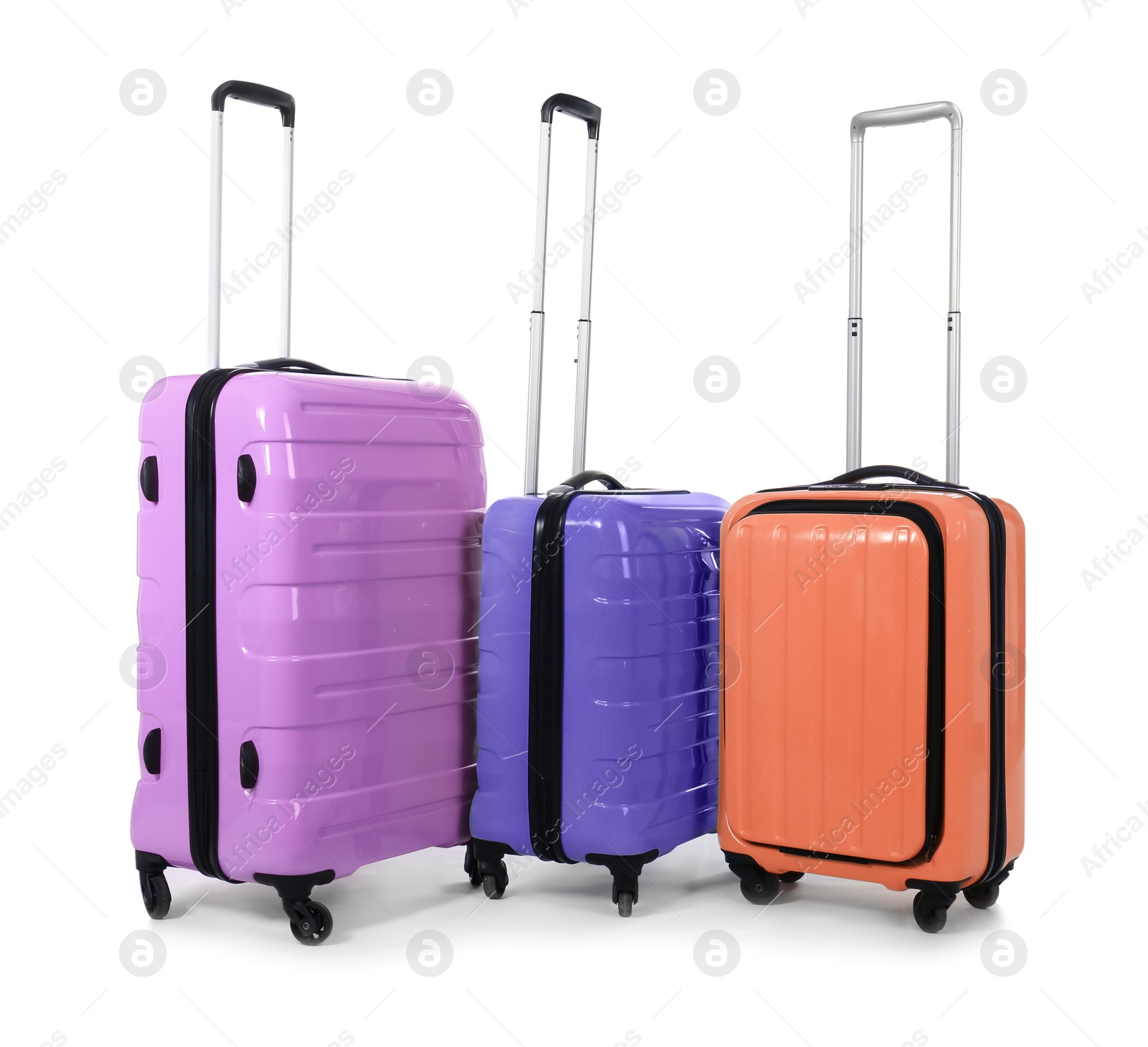 Image of Stylish suitcases packed for travel on white background 