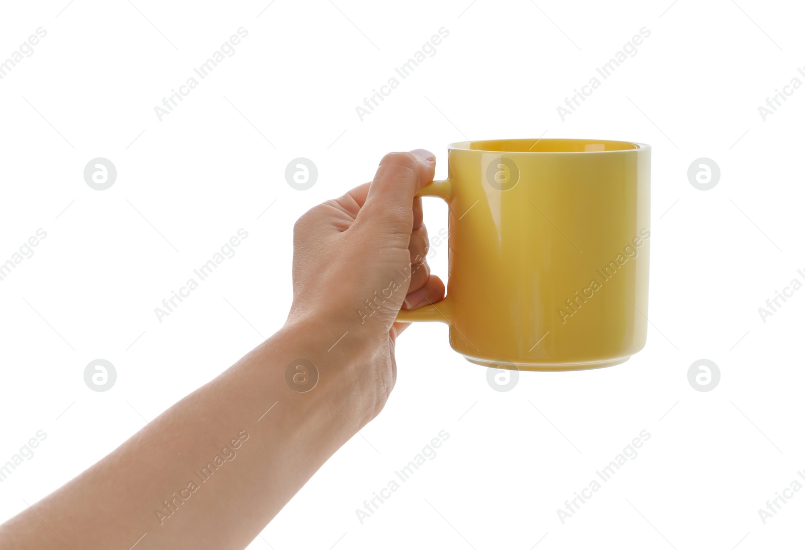 Photo of Woman holding elegant yellow cup on white background, closeup