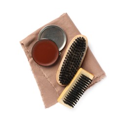 Different shoe care products on white background, top view