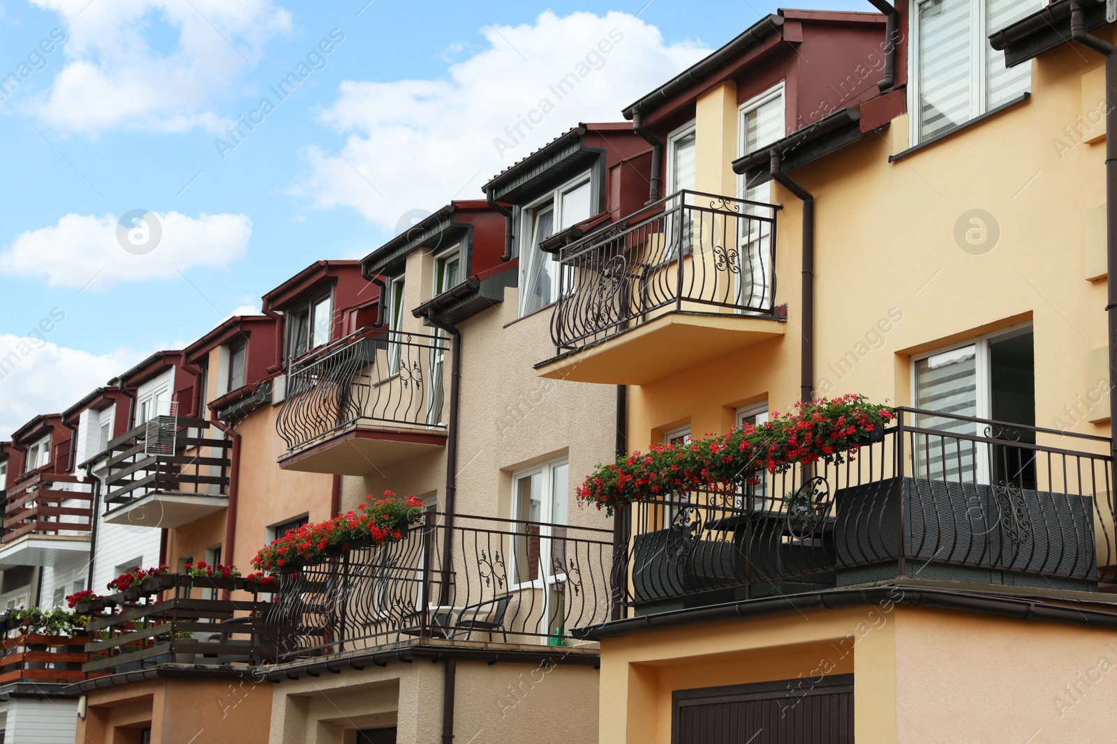 Photo of Beautiful view of building with stylish balconies