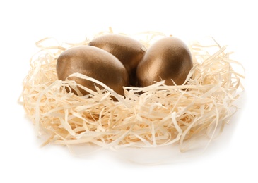 Photo of Nest with golden eggs on white background. Pension concept