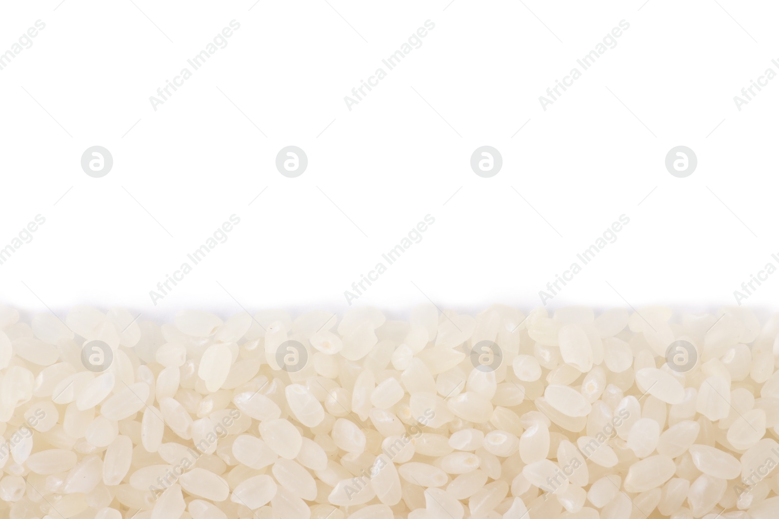 Photo of Raw polished rice isolated on white, top view