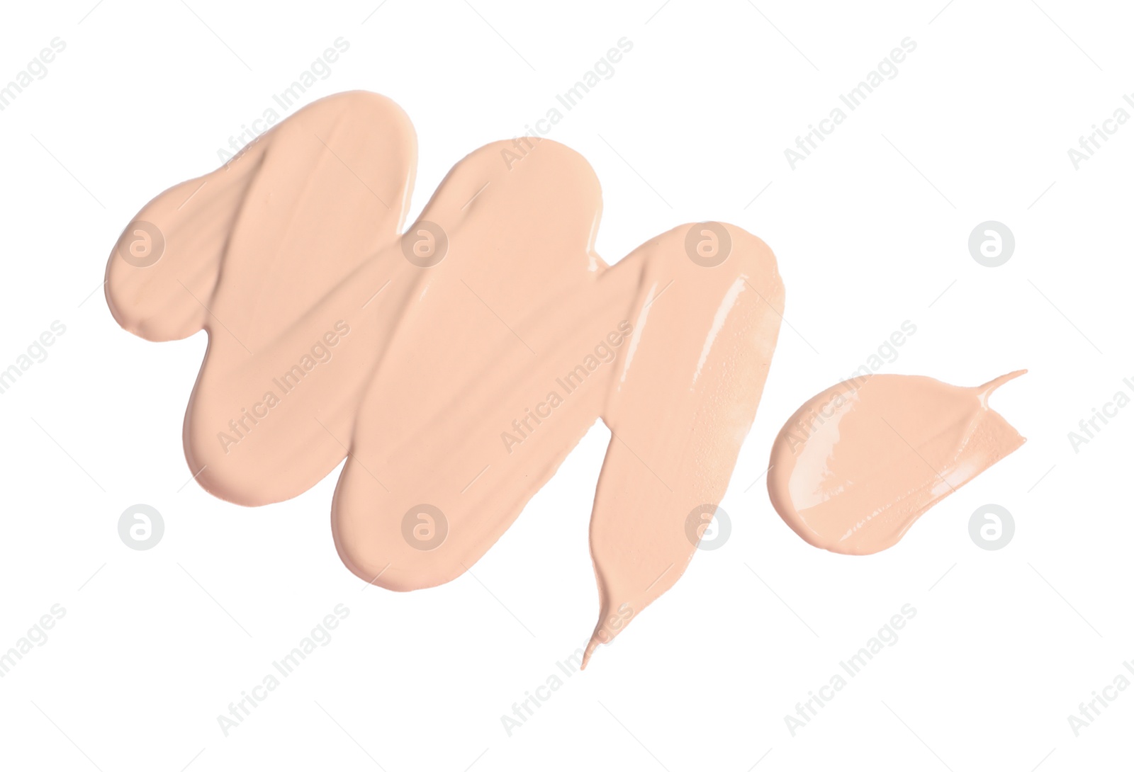 Photo of Smears of skin foundation isolated on white