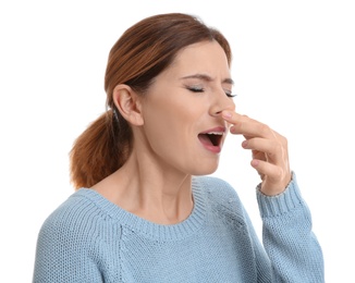 Woman suffering from cold isolated on white