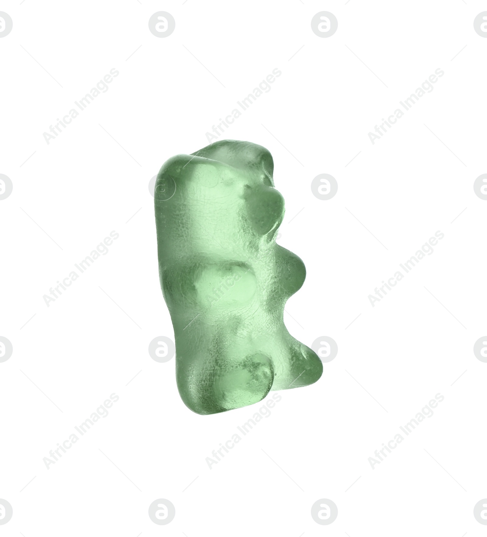 Photo of Delicious green jelly bear on white background