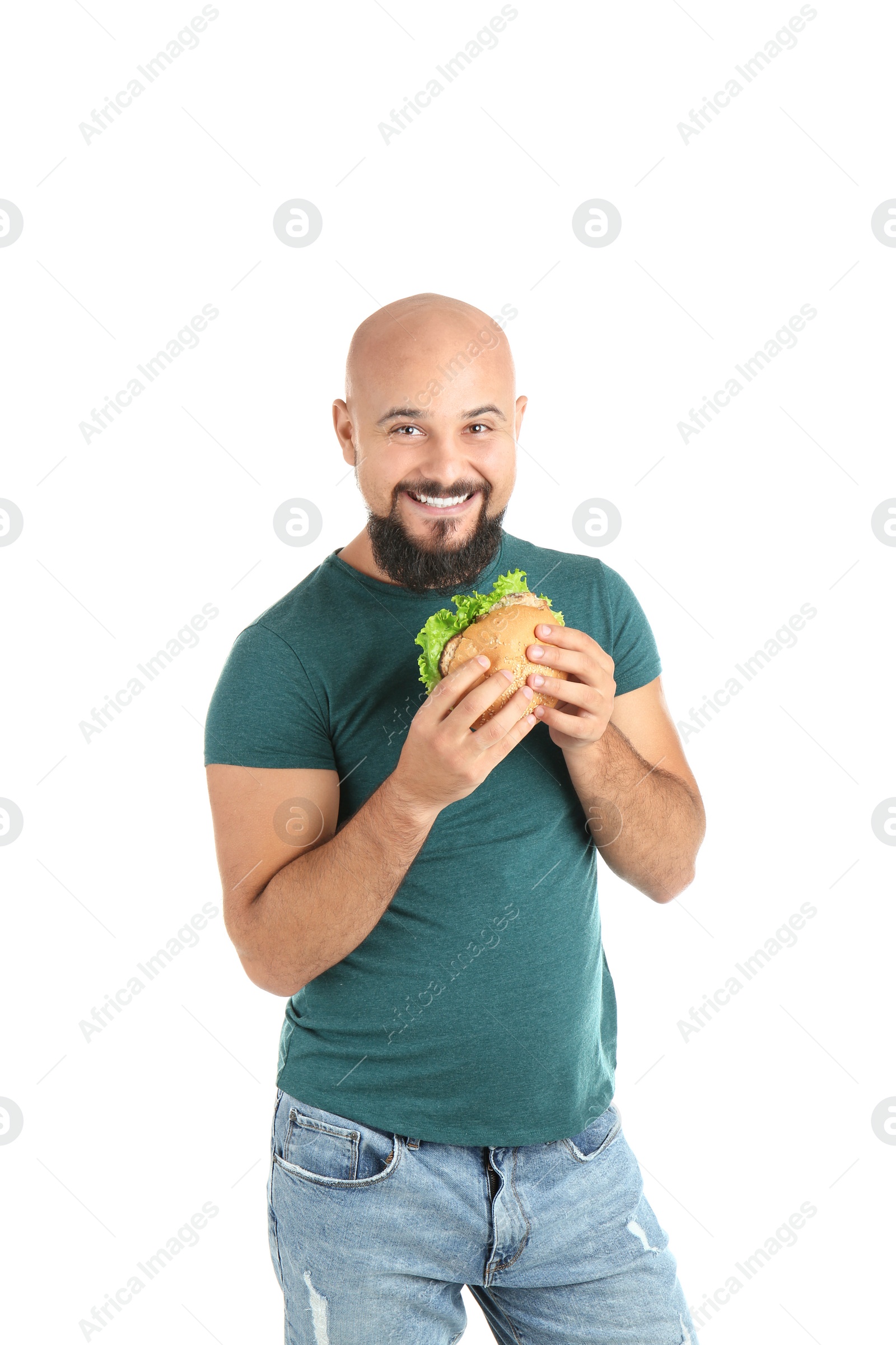 Photo of Overweight man with hamburger on white background