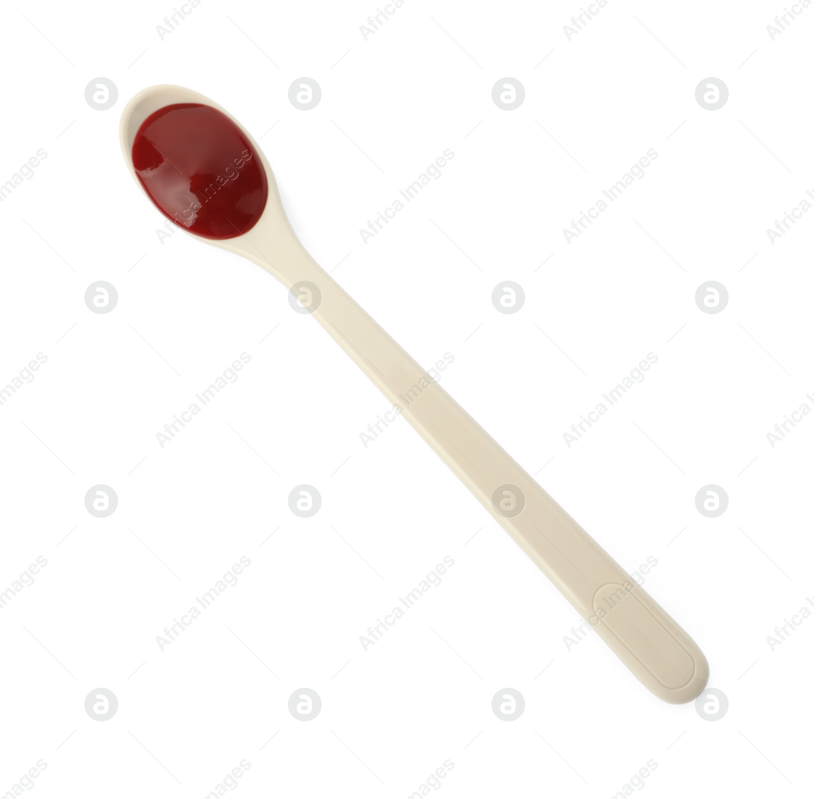 Photo of Spoon of tasty pureed baby food isolated on white, top view