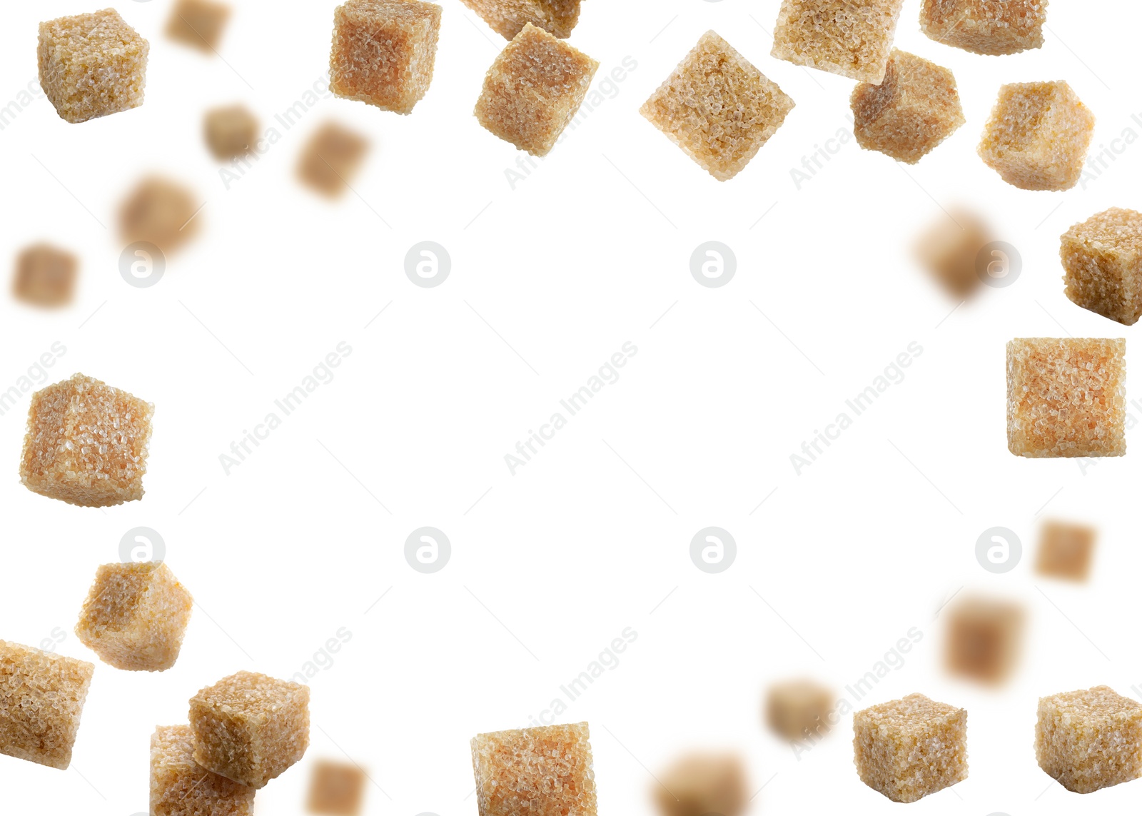 Image of Brown cane sugar cubes in air on white background